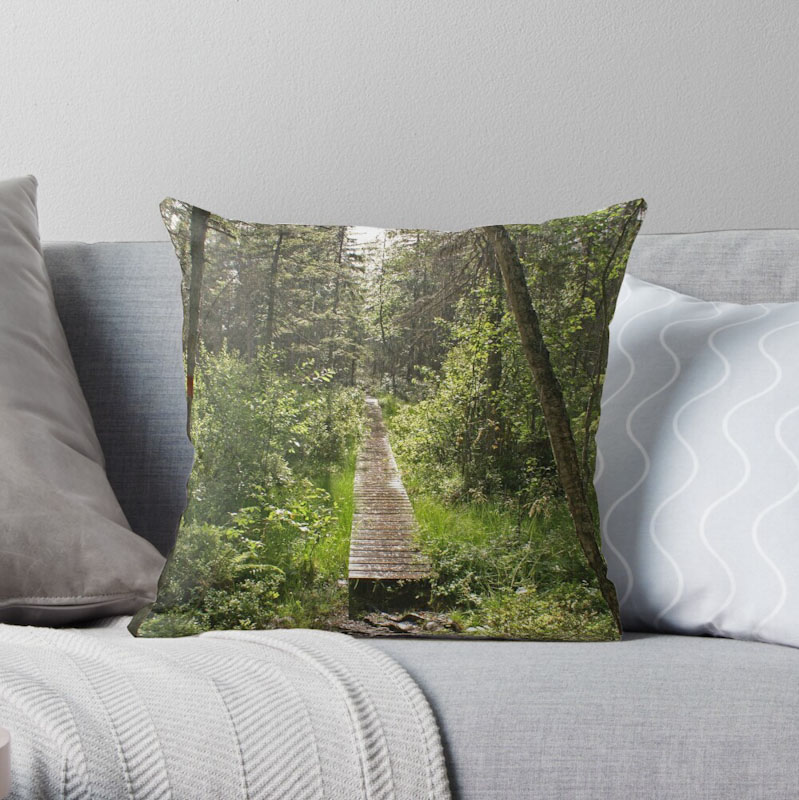Trees in a line during autumn reaching for the sky. Throw pillow.